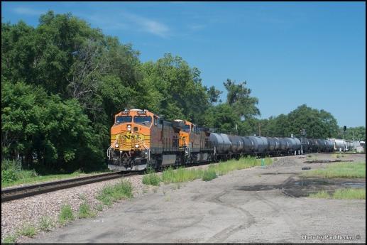 BNSF #4041 (C44-9W built 8/2003) and BNSF #611 (AC44C4M built 2/1994 as ATSF C44-9W #611) are eastbound with a mixed freight crossing the UP/ BNSF diamond at Fremont, NE.