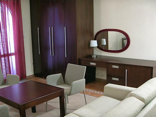 ROOM FACILITIES: All apartments are air conditioned and equipped with