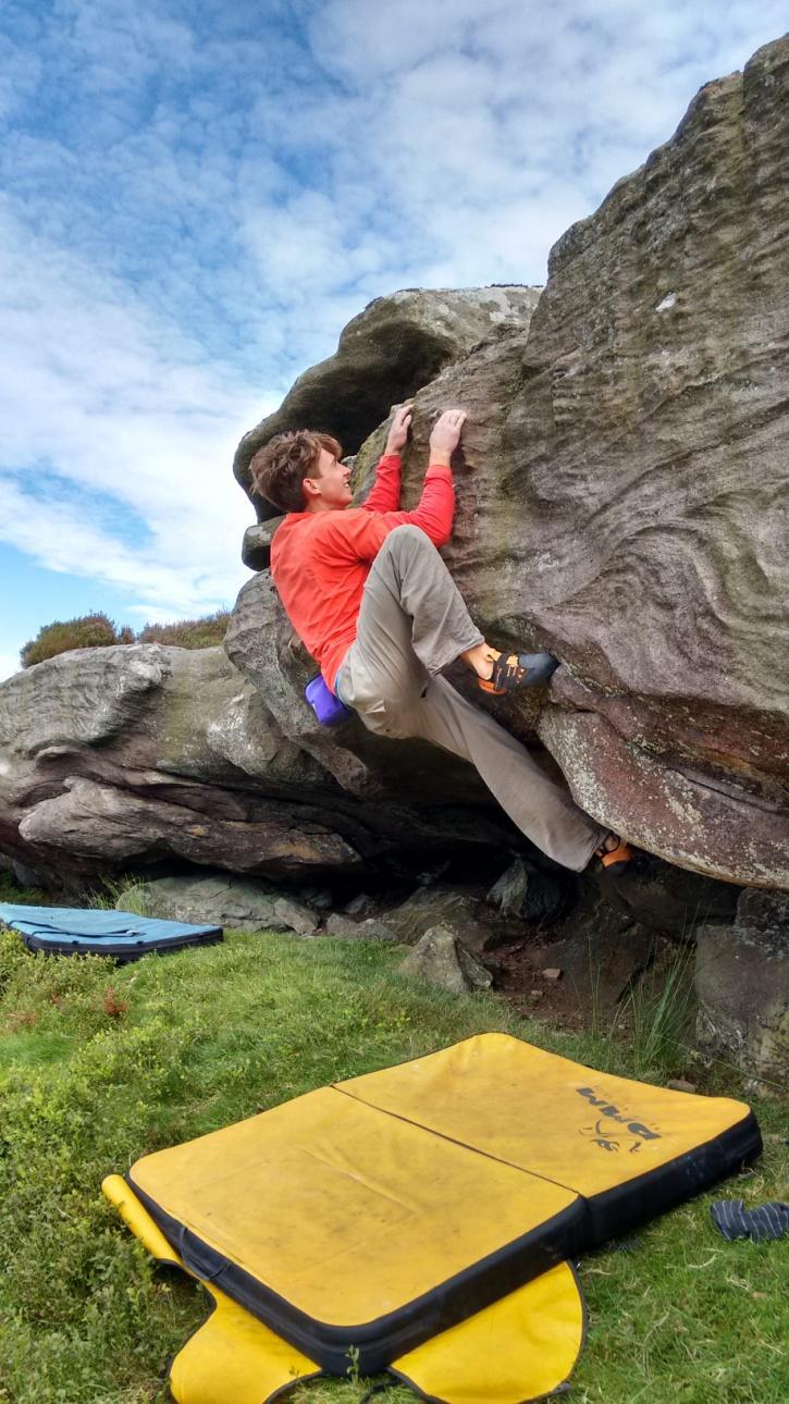 . Ram Ram 6c+ * Hanging traverse left across the break/holds past the low horn and top out over the main bulge after a section on slopers. Crux is not scraping your back on your matt.