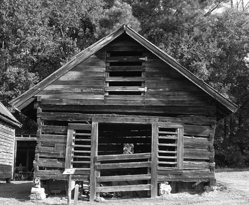 Log Barn was built circa 1800 on the Johnson farm in the Thyatira community