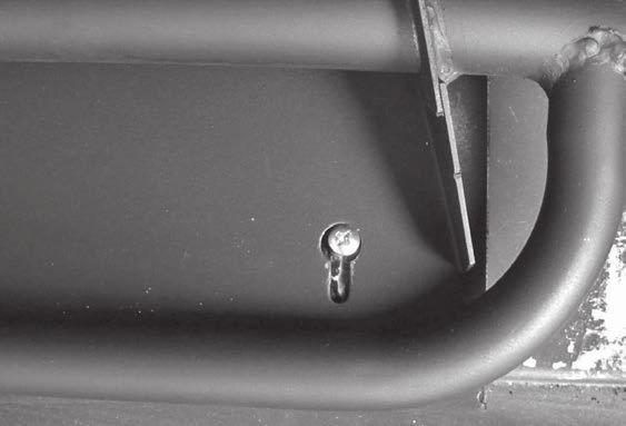 Figure 3: Burner assembly over top of right side screw.