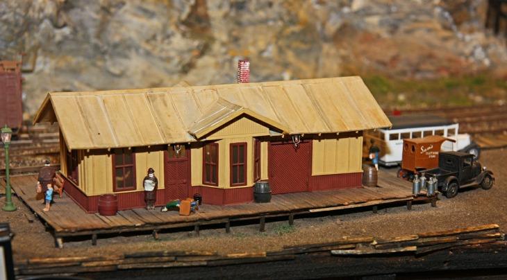 The name of the mine there in yellow is 'EMILY.' Another station with the similar paint scheme with those nice lights on the eaves.