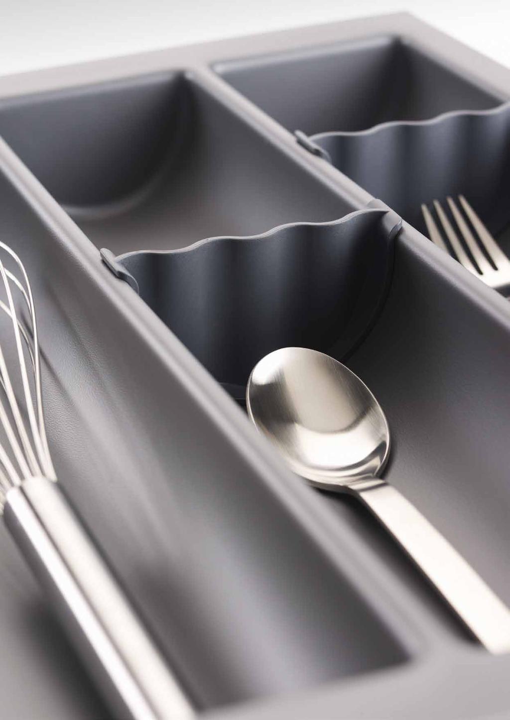 WAVE Image: SLATE GREY The concave shape of this series, which makes it particularly easy to clean, is a further variation of our range of cutlery inserts.