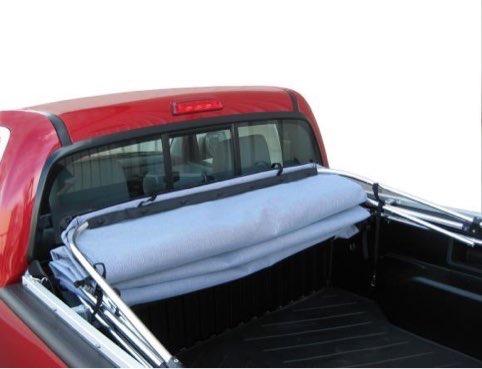 You can leave the front window secured while retracting the canopy.