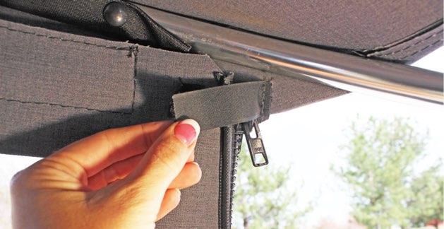 Rear Screen Installation *Purchased Separately 1. Open the tailgate. Unzip the rear window. 2. Completely remove the rear bar from the rear window. 3.