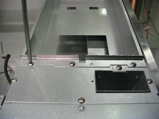 If a grease chute is not required on the burner box, install the grease chute cover to