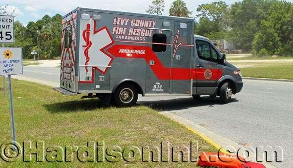 Levy County Department of Public Safety EMS arrives to help accident victims.