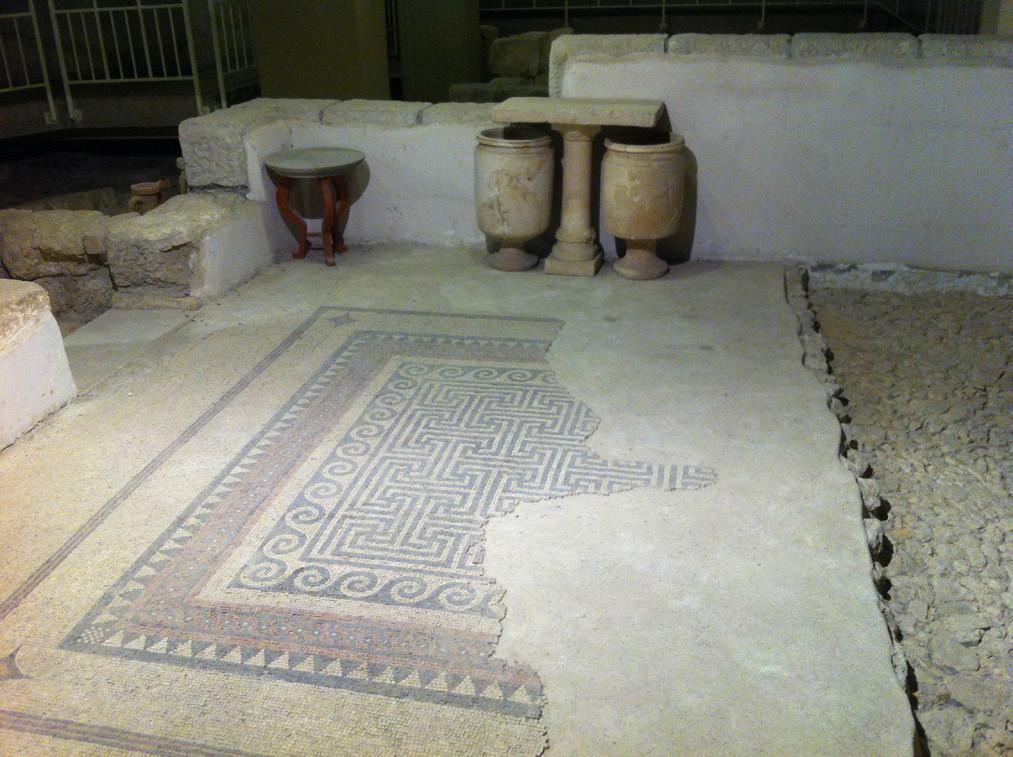 Display and Presentation 67 Figure 17. Mosaic floor, stone tables, and vessels in Palatial Mansion, Wohl Archaeological Museum. Photo by Katharina Galor.