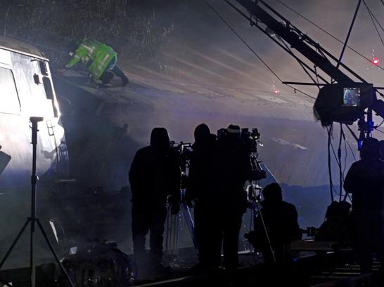 Left:Swithland Sidings signalbox decorated as the derelict Holby Cross West box and surrounded by all the debris from the crash. Below: Filming taking place on the night of 12th February, 2014.