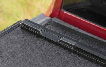 Quickly and easily fold and lock the cover in the flipped up position for hauling large loads.
