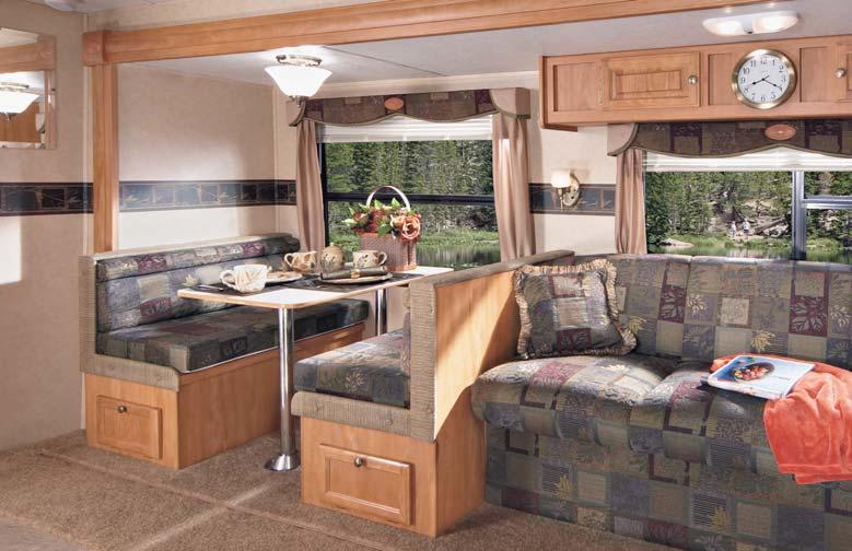 Camelot Green w/sierra Maple Décor Bedrooms offer a quilted bedspread and two bedroom pillows, an extremely comfortable