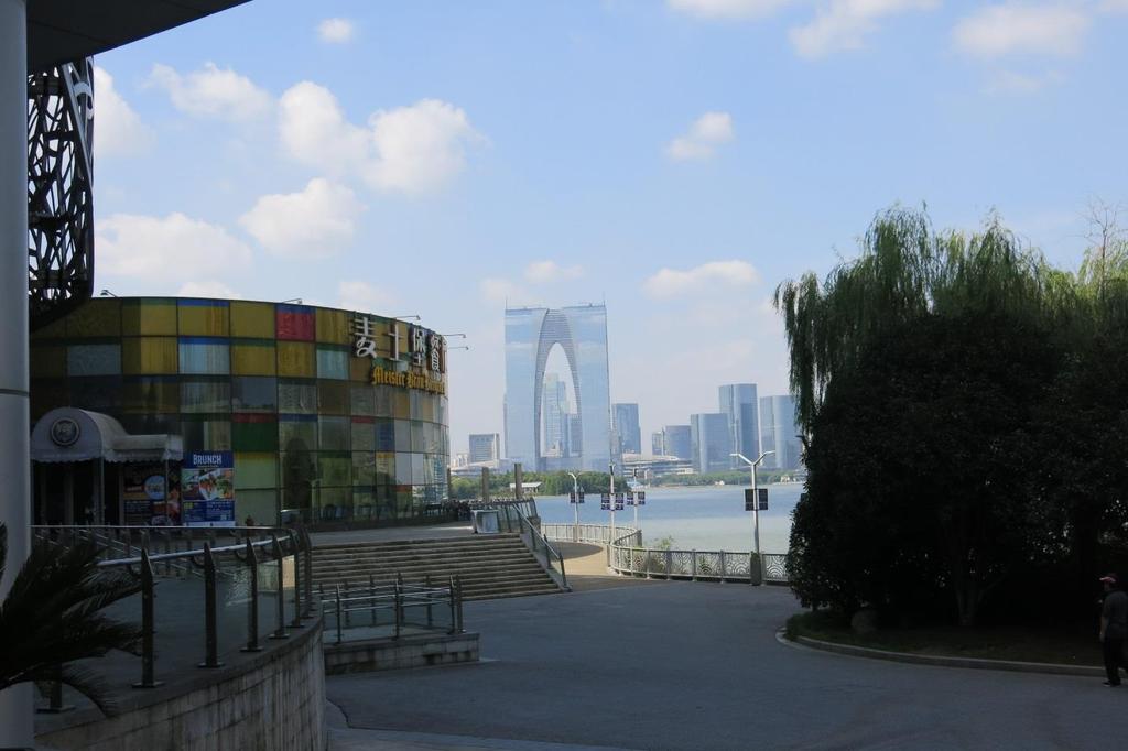 Suzhou 20-21 September 2016 Tuesday, September 20 This morning, the tour group started out in the Industrial and Educational Park with a quick visit at Jinji Lake (Golden Rooster Lake), one of the