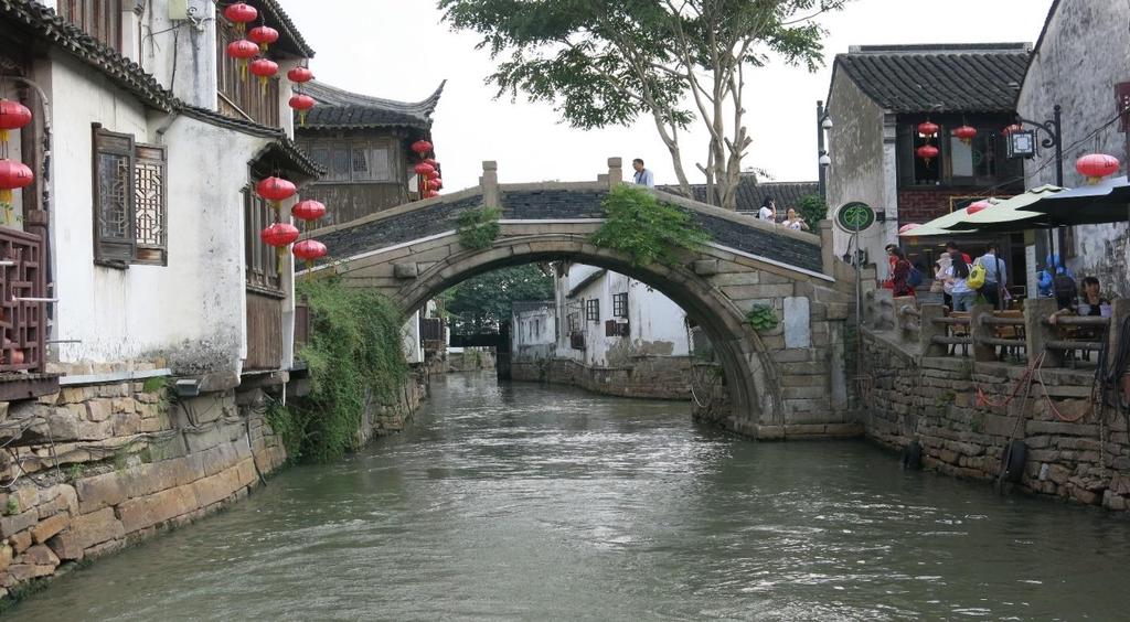 The canal runs alongside an ancient pedestrian road, Shantang Street, cited as the First Street in Suzhou