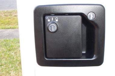 The second switch (to the left) is an additional security bolt for in- transit travel with children, or to