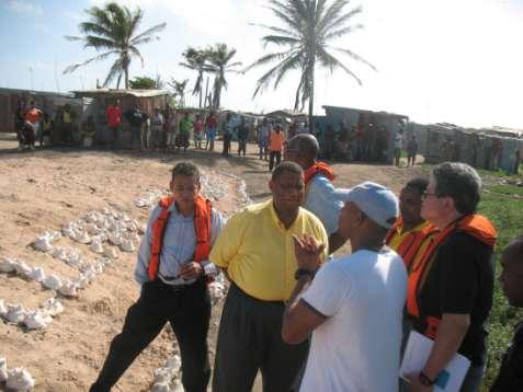 L. Meggs of TNC discussing cleanup activities with Honorable Ministers Clarke, Arscott, Ferguson as well as Dr. Osbil Watson (Vet Services Division) and Mr.