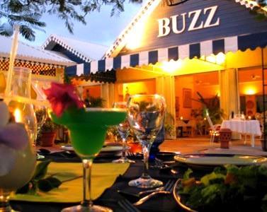 Buzz Seafood and Grill A charming restaurant and bar with a warm ambiance.