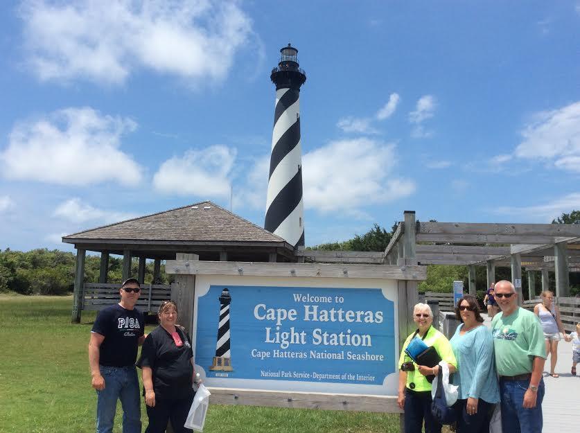 Our next stop was the Cape Hatteras Lighthouse and the picture below is our little tour group by the lighthouse sign. This lighthouse was built in 1870 and at 198.