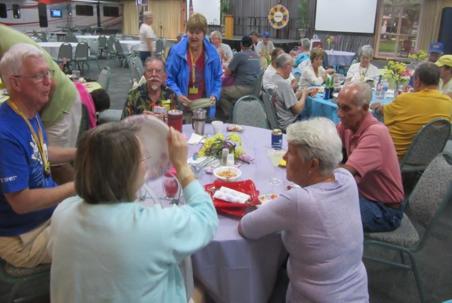 The rally hall tables were decorated in pastel colored table covers with flowers and Easter candy to add to the decorations. Happy Hour began at 4:00pm with a table full of snacks!