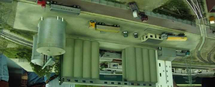 The layout era is pretty loose, with most vehicles and railroad equipment in the 50 s to 70 s range. As you may gather from the photos, the layout is built pretty low.