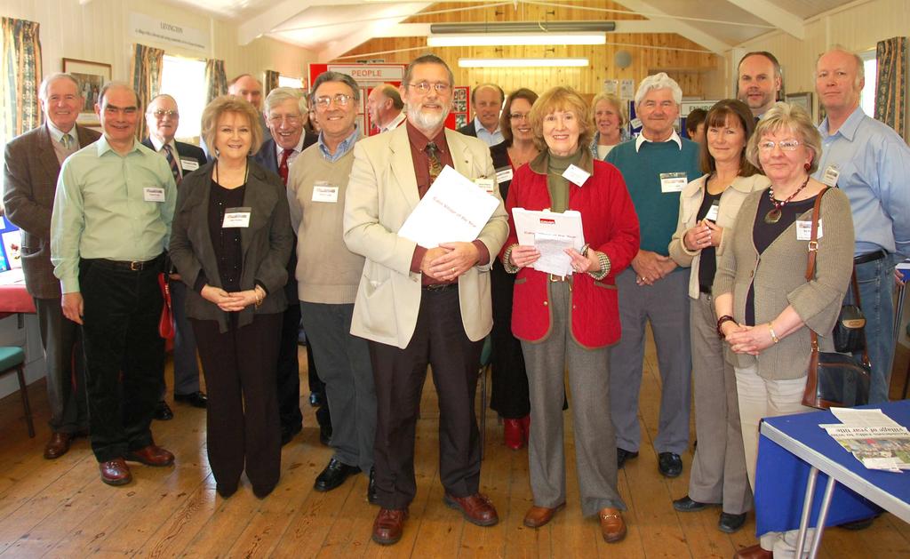 Judges David Perkins and Pamela Bywater (front centre) surrounded by enthusiastic villagers. After judging day, we were on tenterhooks yet again waiting for the Regional results.