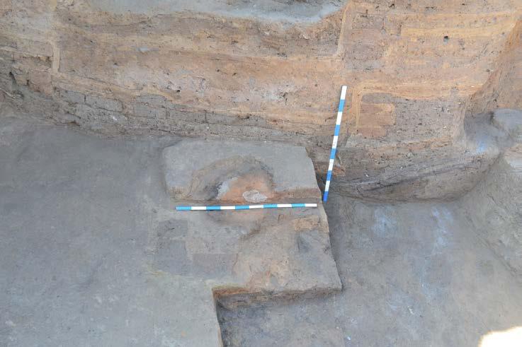 Pic. 5. Room 30. Section of the floor oven and of the western sufa. View from the north.