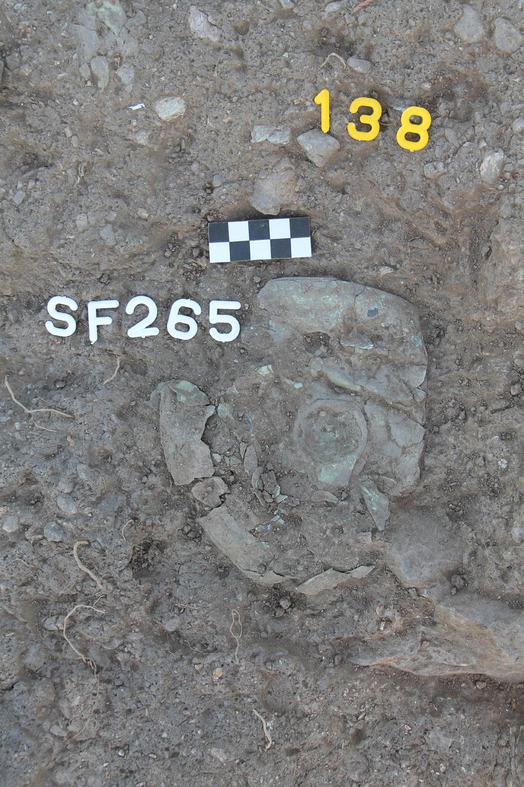 Fig. 7. Bronze phiale mesomphalos found in Tr. 20aW two campaigns. In 2013, a wall (un. 107) was discovered in Tr. 2e running north south and set against two bedrock outcrops.
