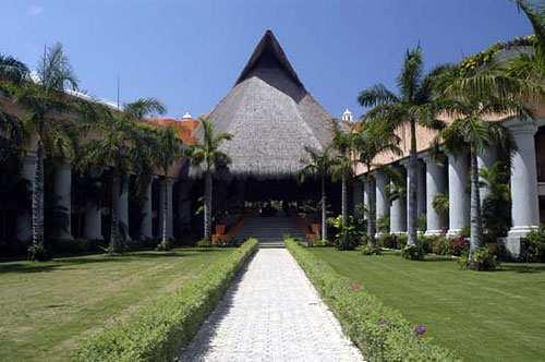 PLAYA DEL CARMEN Set amid lush tropical gardens, this upscale, Mayan-inspired resort adjoins the Playacar Golf Club.