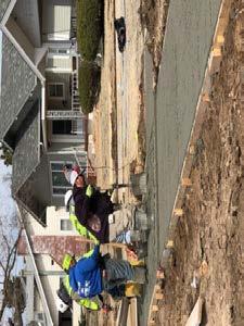 15. Building Solutions was able to complete the sidewalk and driveway work on the 1500 Block