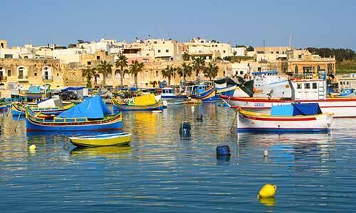 Marsaxlokk Fishing Village Marsaxlokk is a small fishing village with a population of around 4,000 located on the south-eastern coast of Malta located at the shoreline of the second largest port in