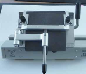 7. Daily Use of the Instrument Adjusting the anti-roll guide system You can adjust the height of the anti-roll guide system using the knurled nut (8): If you