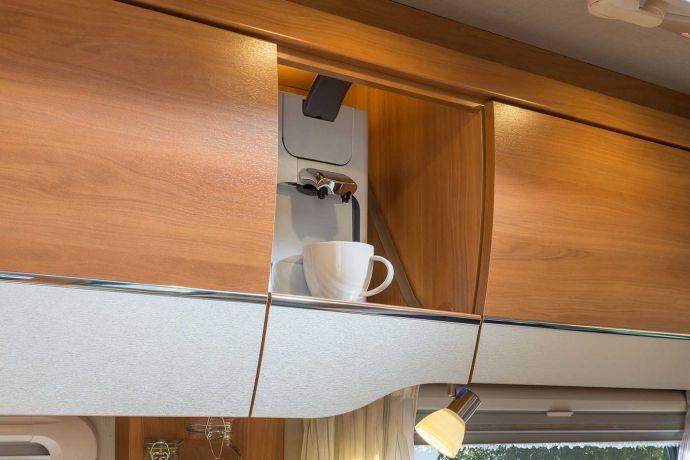 Pull-out compartment The pull-out compartment is an ideal place for your coffee machine or similar.