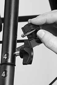 fig. 7 fig. 8 fig. 9 3. Install both rear legs: Match leg number to frame tube number and insert leg into tube as shown in fig. 7. Secure with E-clip and male knob as shown in figs. 8 and 9.