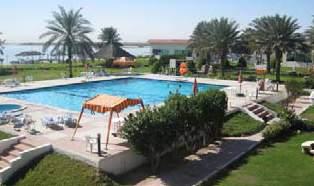 The air-conditioned villas at the Umm Al Quwain Beach Hotel offer a private balcony with