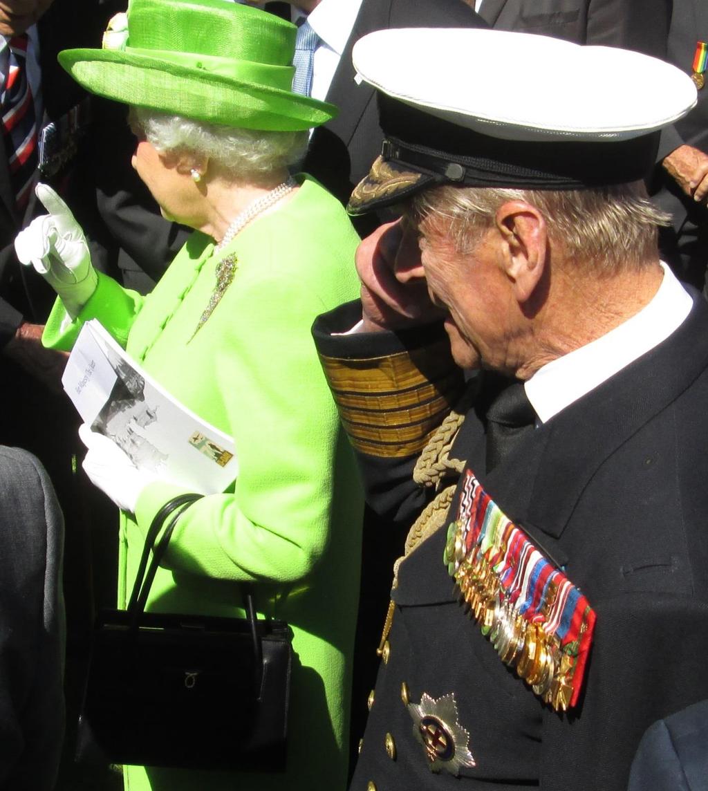 Her Majesty the Queen and Prince Philip speak to
