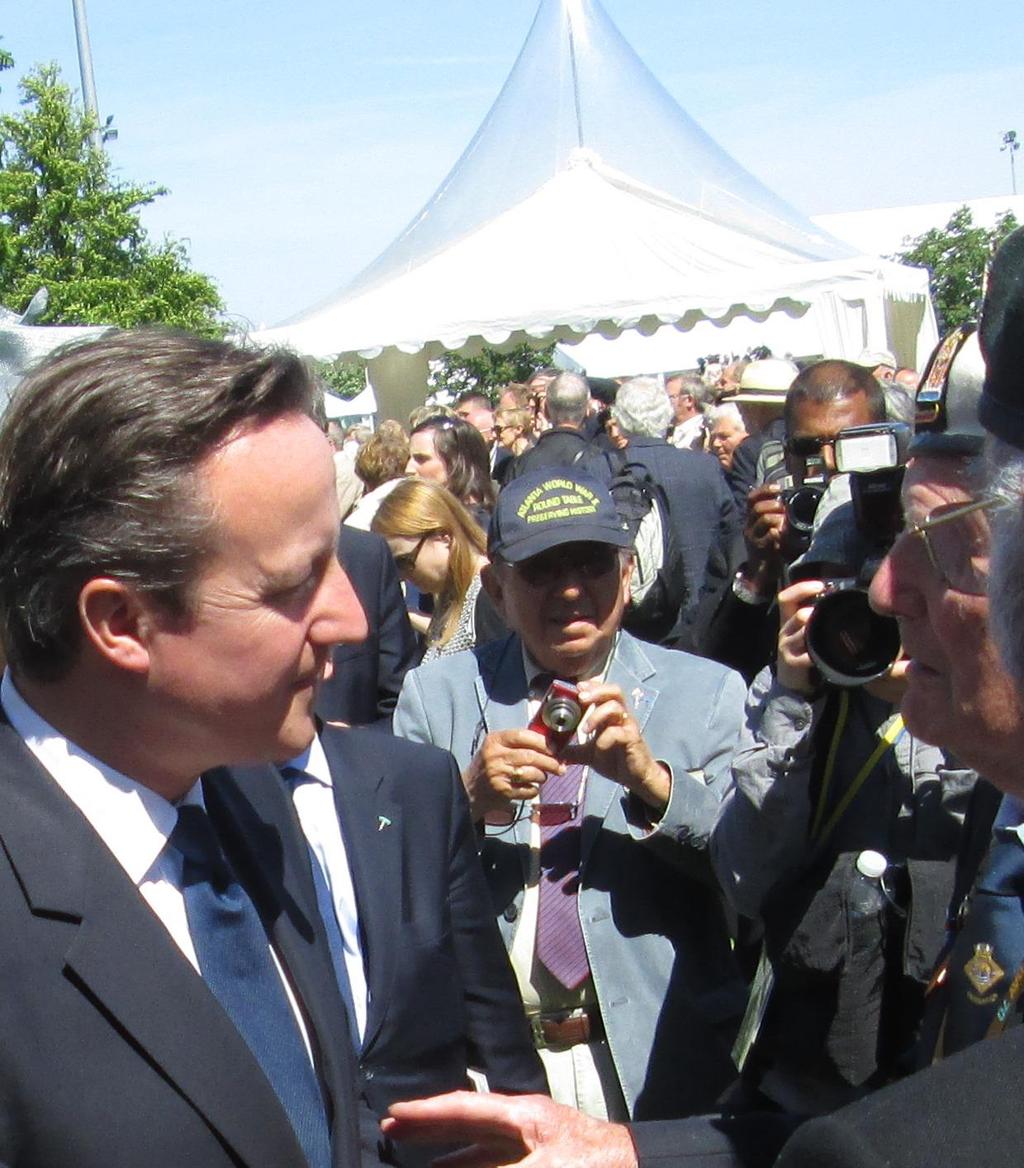 The Prime Minister speaking to a Veteran of D-Day Bayeux, Normandy, 6 th June 2014 On the evening of 6 th June we attended another service at Arromanches.