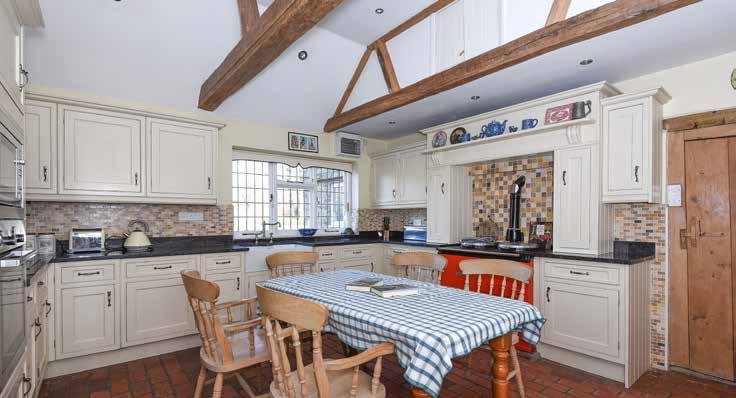Bulchins Farmhouse A delightful five bedroom detached country property full of character, set in grounds of approximately 1.5 acres.