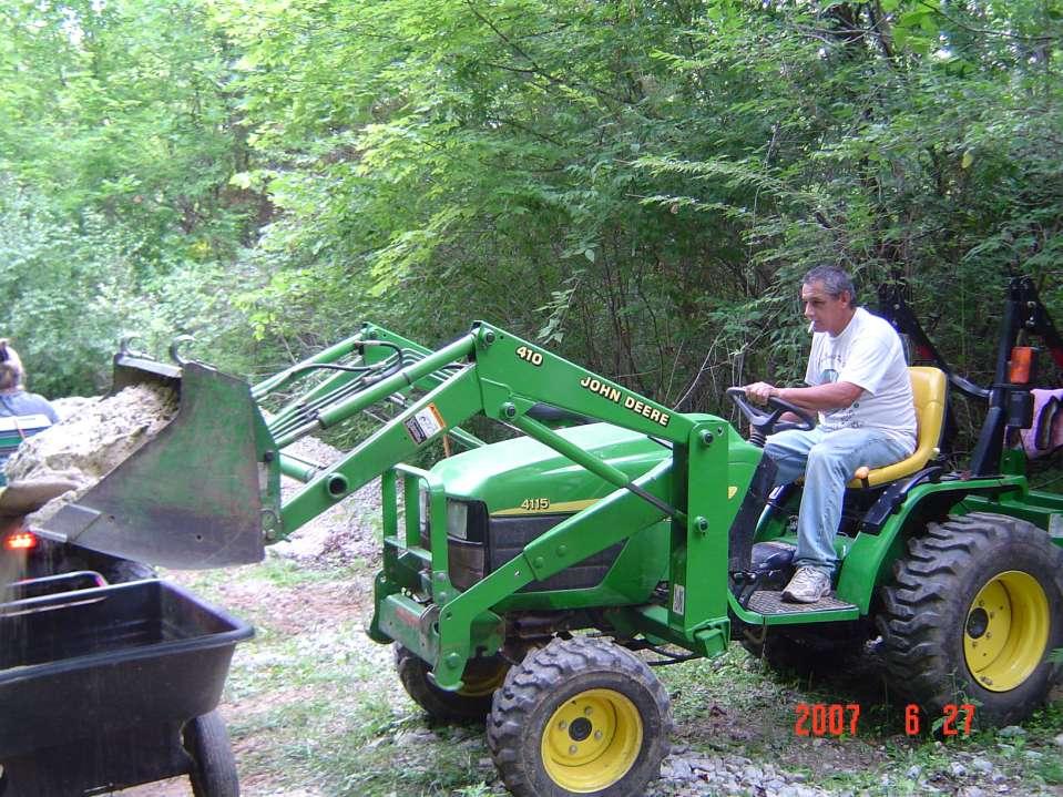 A MAN AND HIS TRACTOR,