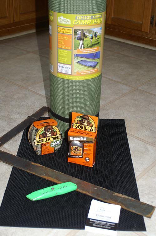 Shopping List: 1. Camping Mat: $14.97 in store at Walmart or online. a. http://www.walmart.com/ip/venture-products-llc-outdoors-travel-light-classic- Camp-Pad-25-x-78-Green/23382498 2. Rubber doormat.