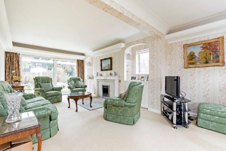 an extremely versatile property. On entering the house there is a light and spacious central entrance hall with access to five rooms.