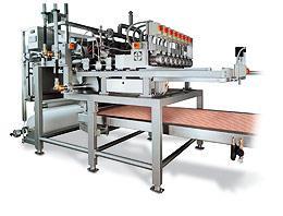 Conbar roller former Type WET for forming a thin (2 to 5mm) layer of caramel, fudge, jam or agar jelly on top of the cereal slab.