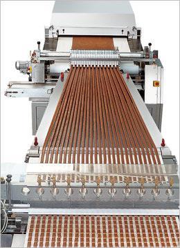 Cutting Systems Sollich s range of guillotines and cutting systems have been especially developed to meet the requirements of modern praline or bar manufacturing lines