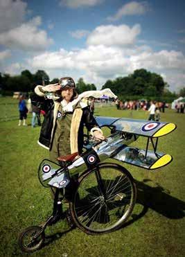 Each year, costume characters and actors dressed as pilots are part of the airshow entertainment like this fellow with his bicycle plane.