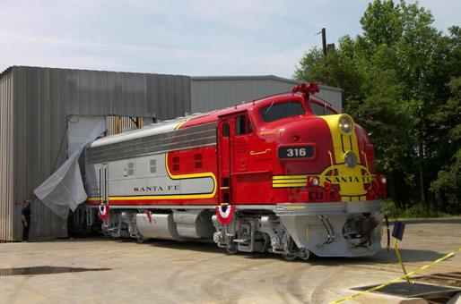 ATSF F-7 UNVEILING Warbonnets in Greenville by Rob Seel Motive Power & Equipment Solutions in Greenville, SC has finished restoring two 1953