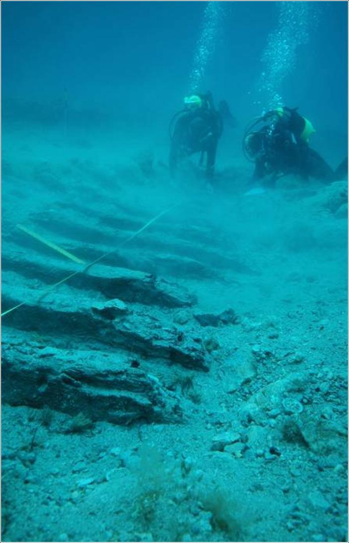 A systematic underwater survey of the wider bay revealed extensive spreads of antique pottery and at least one probable Roman wreck site of the 2nd to 1st centuries BC, marked by large numbers of