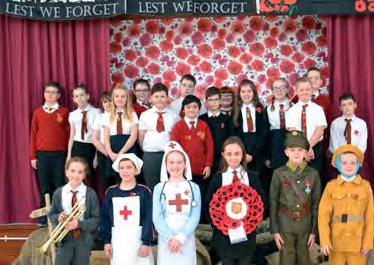 A few children discussed how the poppies were grown, are worn and why we should buy them to support the