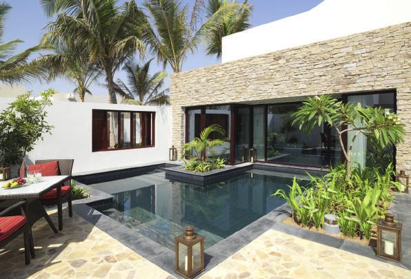 2 One Bedroom Lagoon View Villa 176 Sqm Relax inside an elegant bedroom, outdoor garden dining terrace and lounge area with a view overlooking the translucent freshwater lagoon nestled discreetly