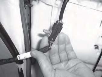 27. Route, clip, and connect harness to seat back head