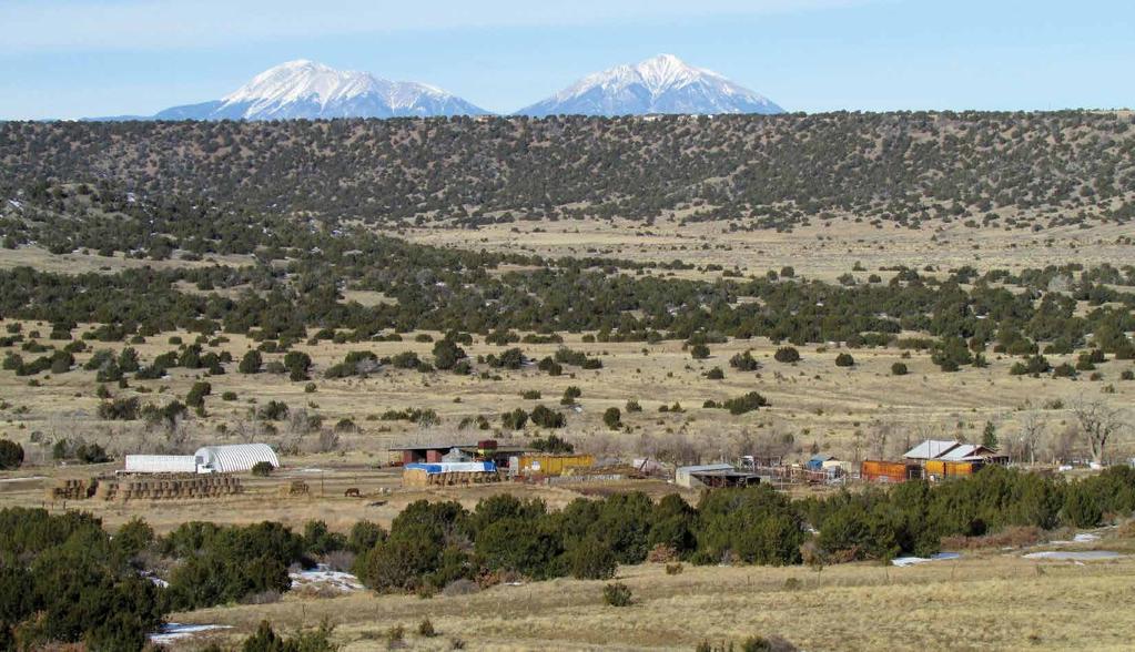 Ranch Setting s s The setting of this ranch is among one of its greatest attributes. Located just 6.5 miles from town, this ranch is very accessible yet it has a very secluded feel.