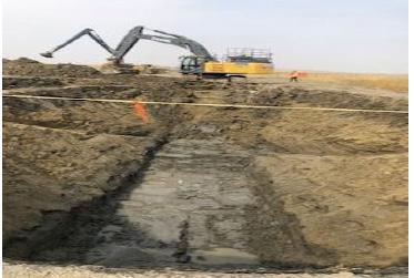 Excavator digging bore