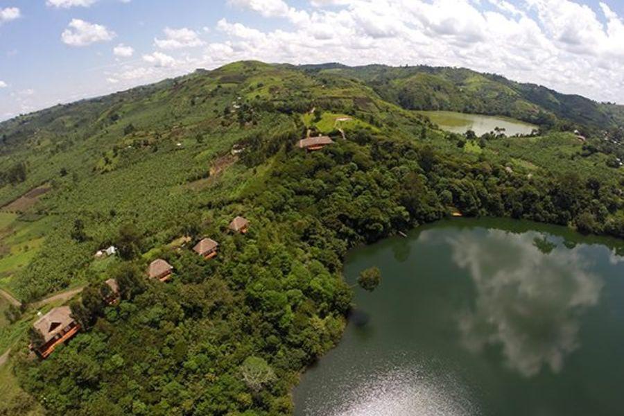 PAPAYA LAKE LODGE A short drive along a dirt road from Fort Portal is the Papaya Lake Lodge, surrounded by lush, evergreen landscapes of the Ugandan Great Crater Lakes region.